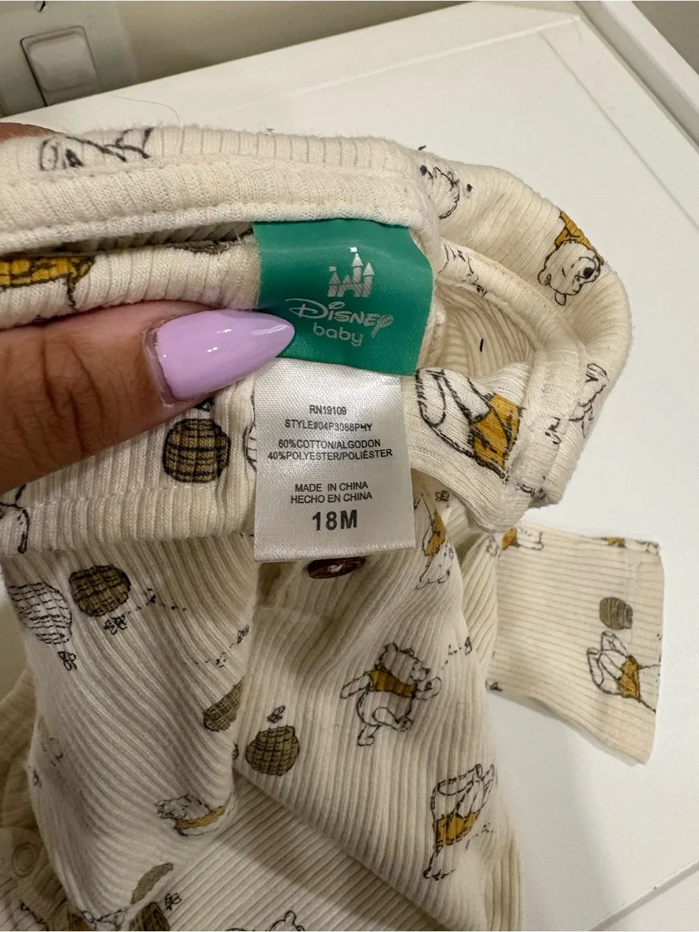 Disney Cream Ribbed Long-Sleeve One-Piece with Yellow & Brown Print